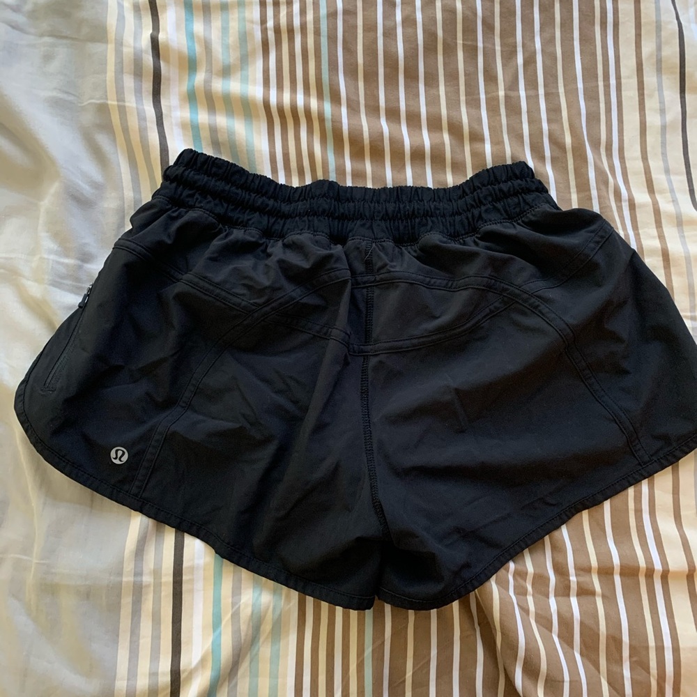 Black lululemon running shorts.